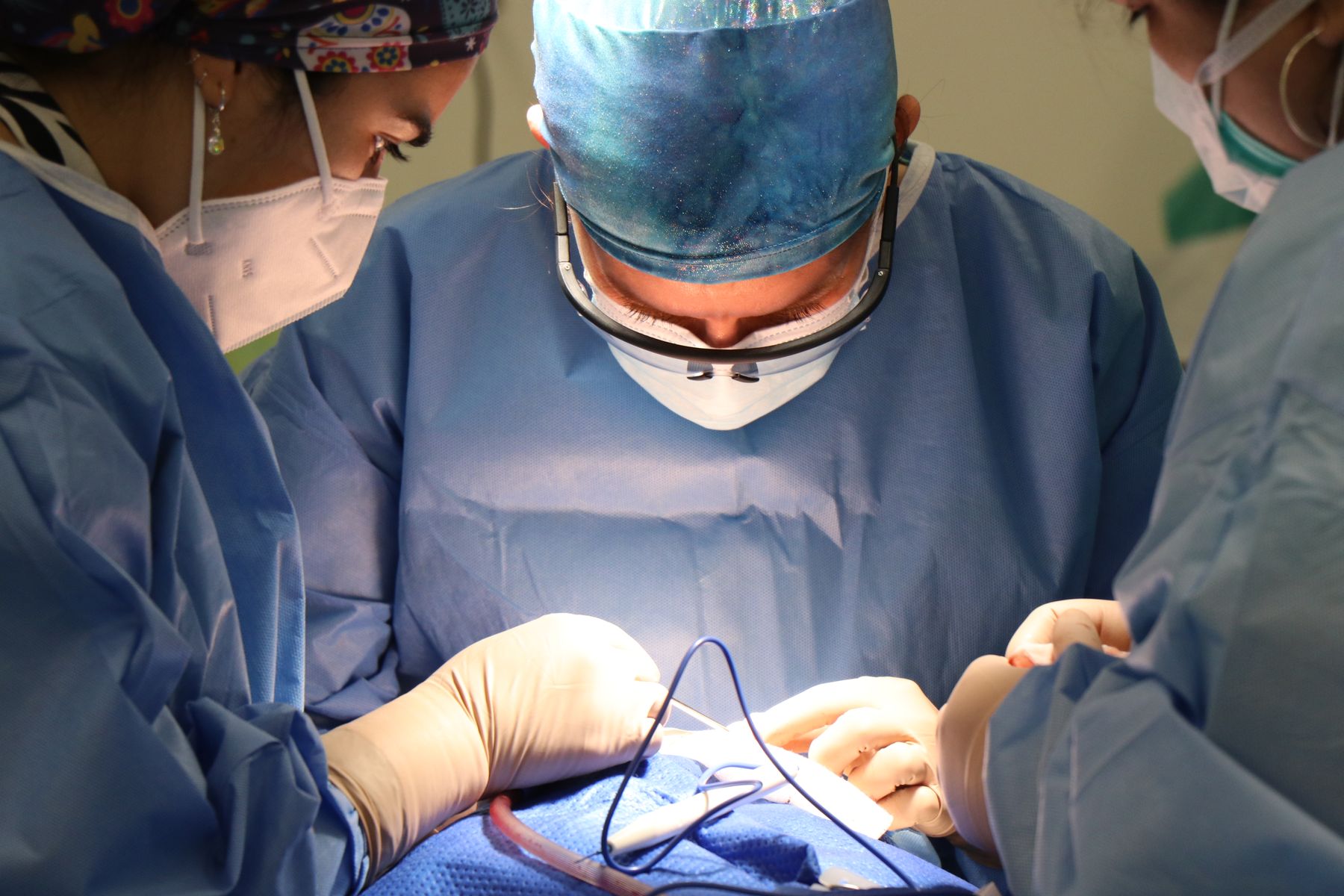 Medical team working in an operating room