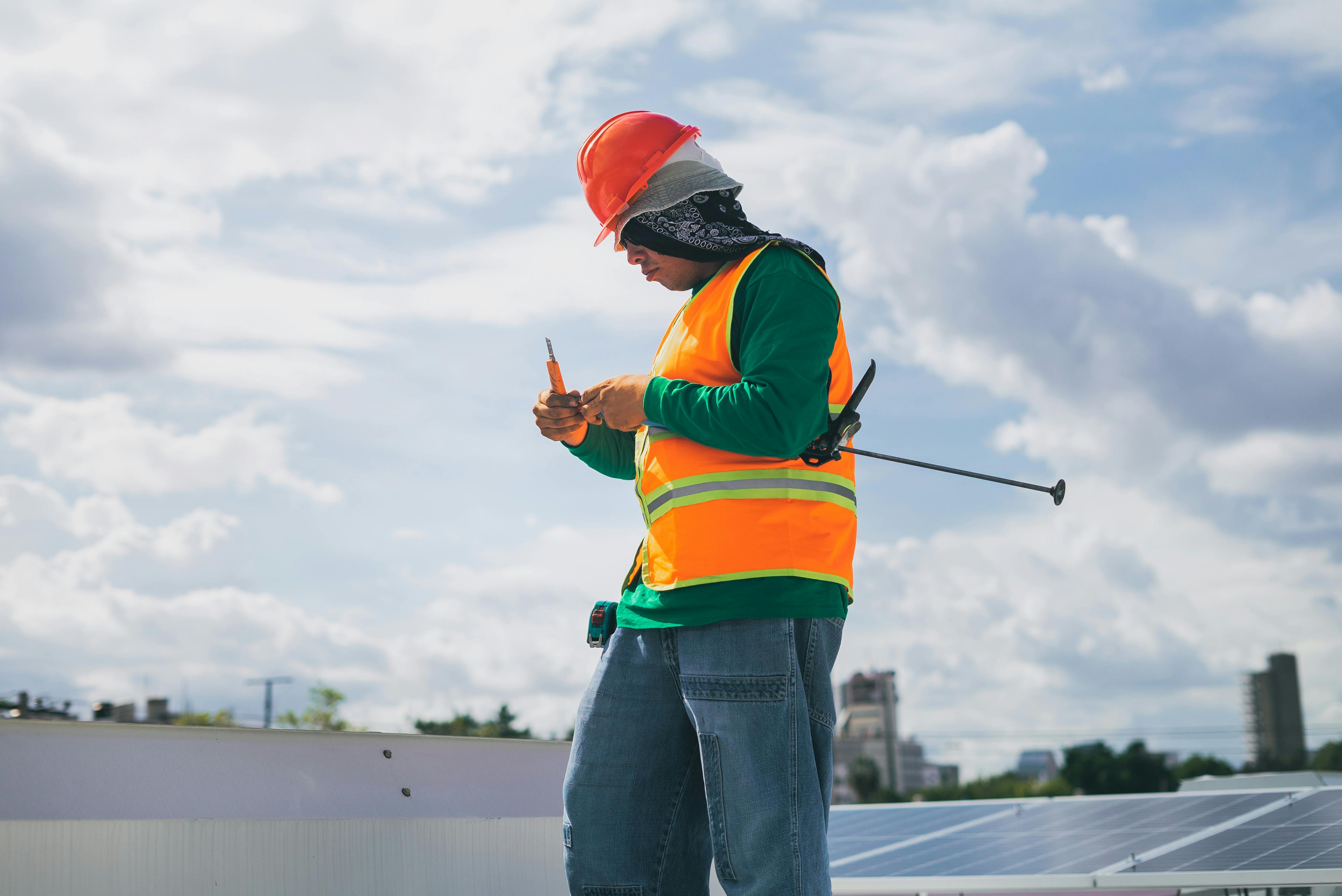 low angle shot of solar technician