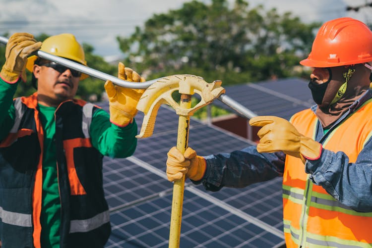 Solar Technicians Working On Site