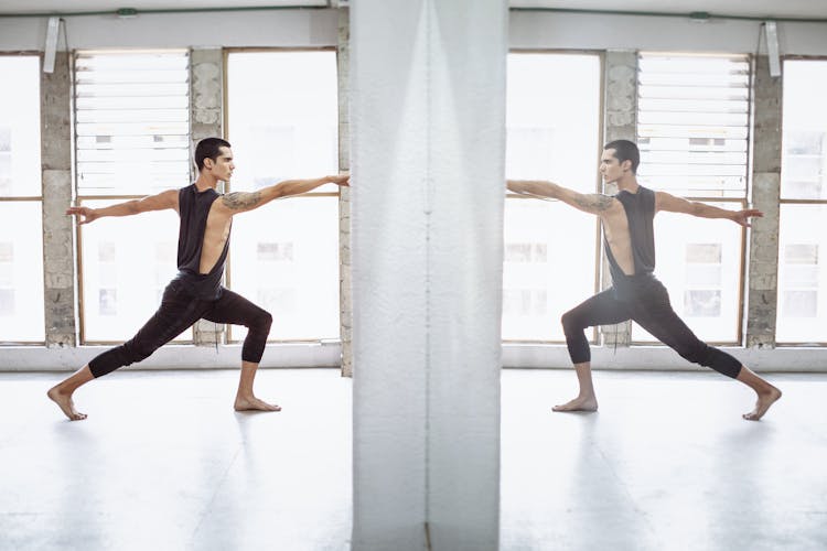 A Ballet Dancer Rehearsing In A Studio