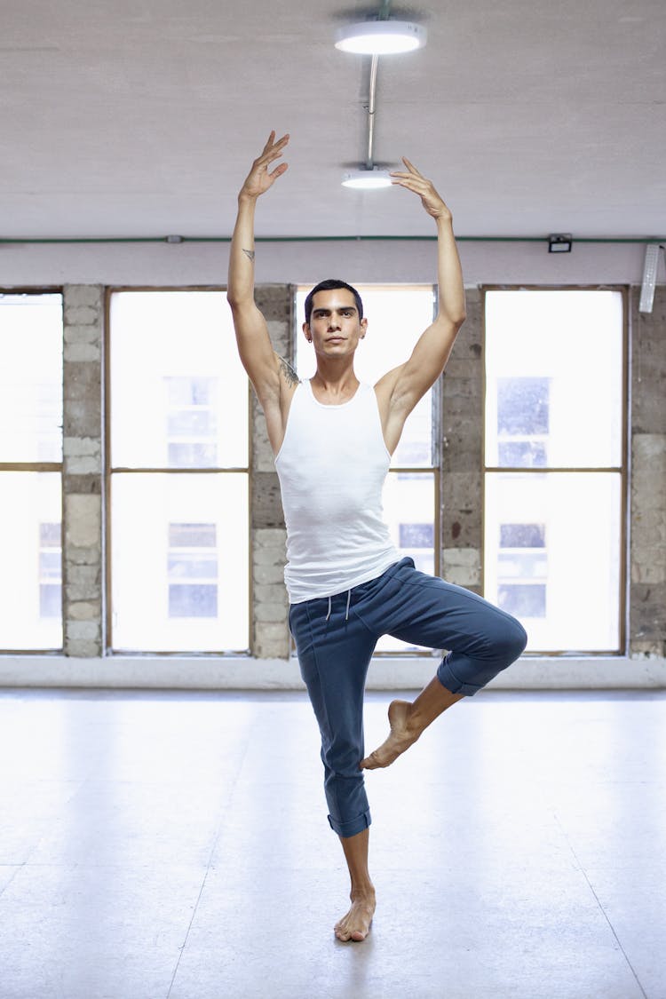 A Man Dancing Ballet In The Studio