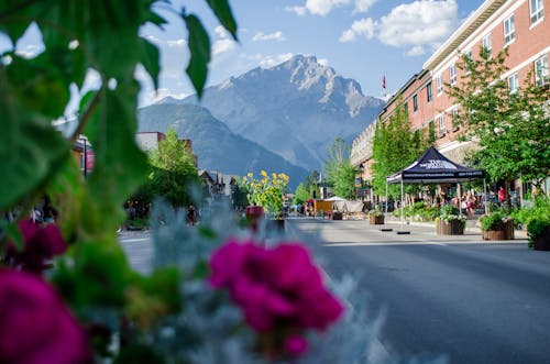 Free View of the Mountain from the Street in a Town Stock Photo
