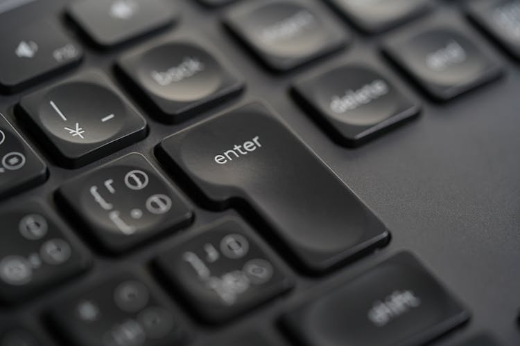 Close-up Of Enter Key On Keyboard