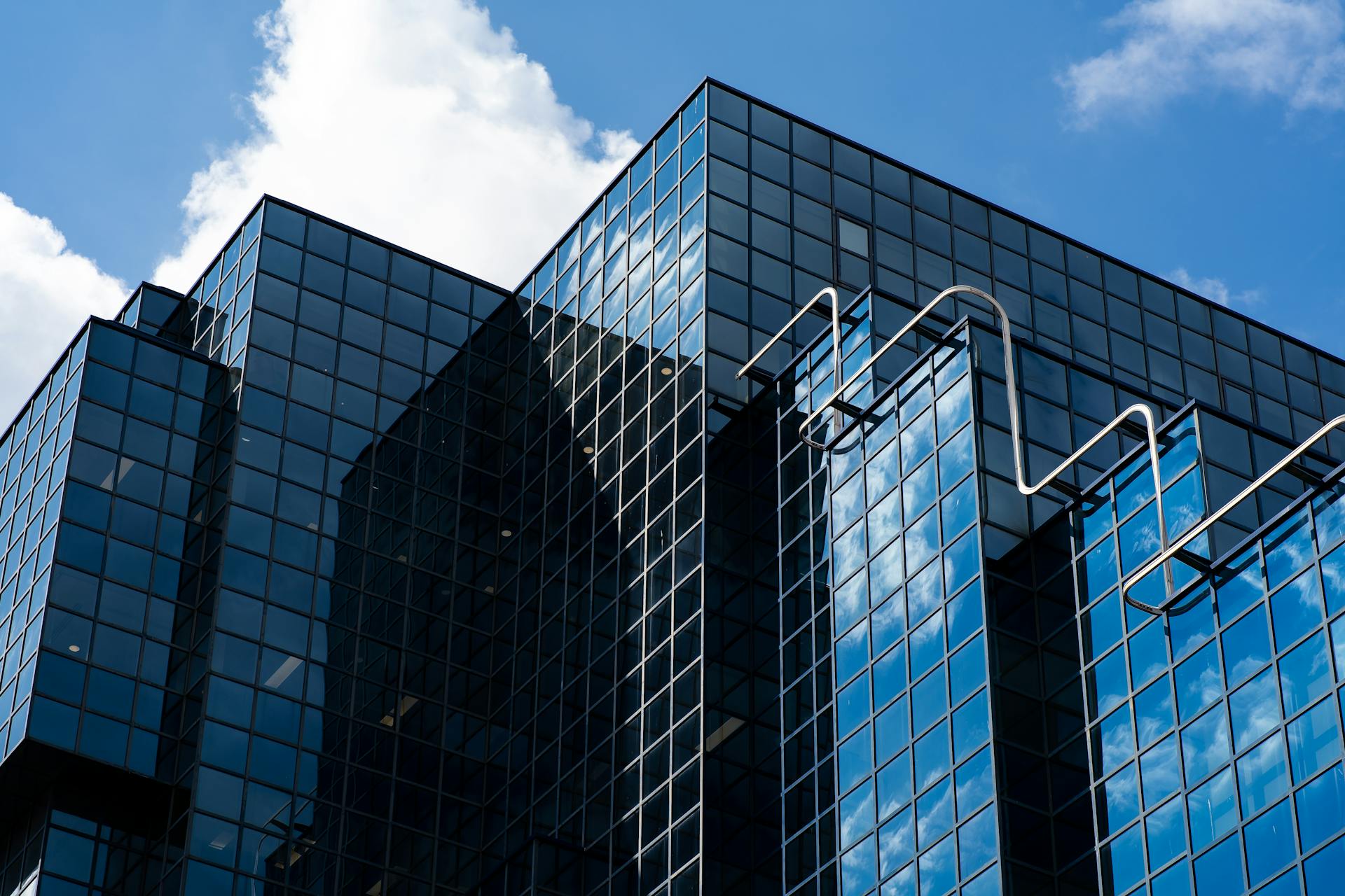 A Tall Glass Building with Steel