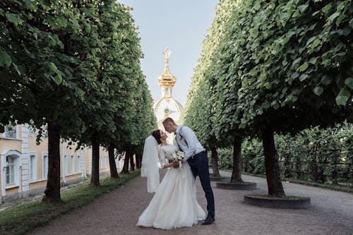 Married Couple in between Trees