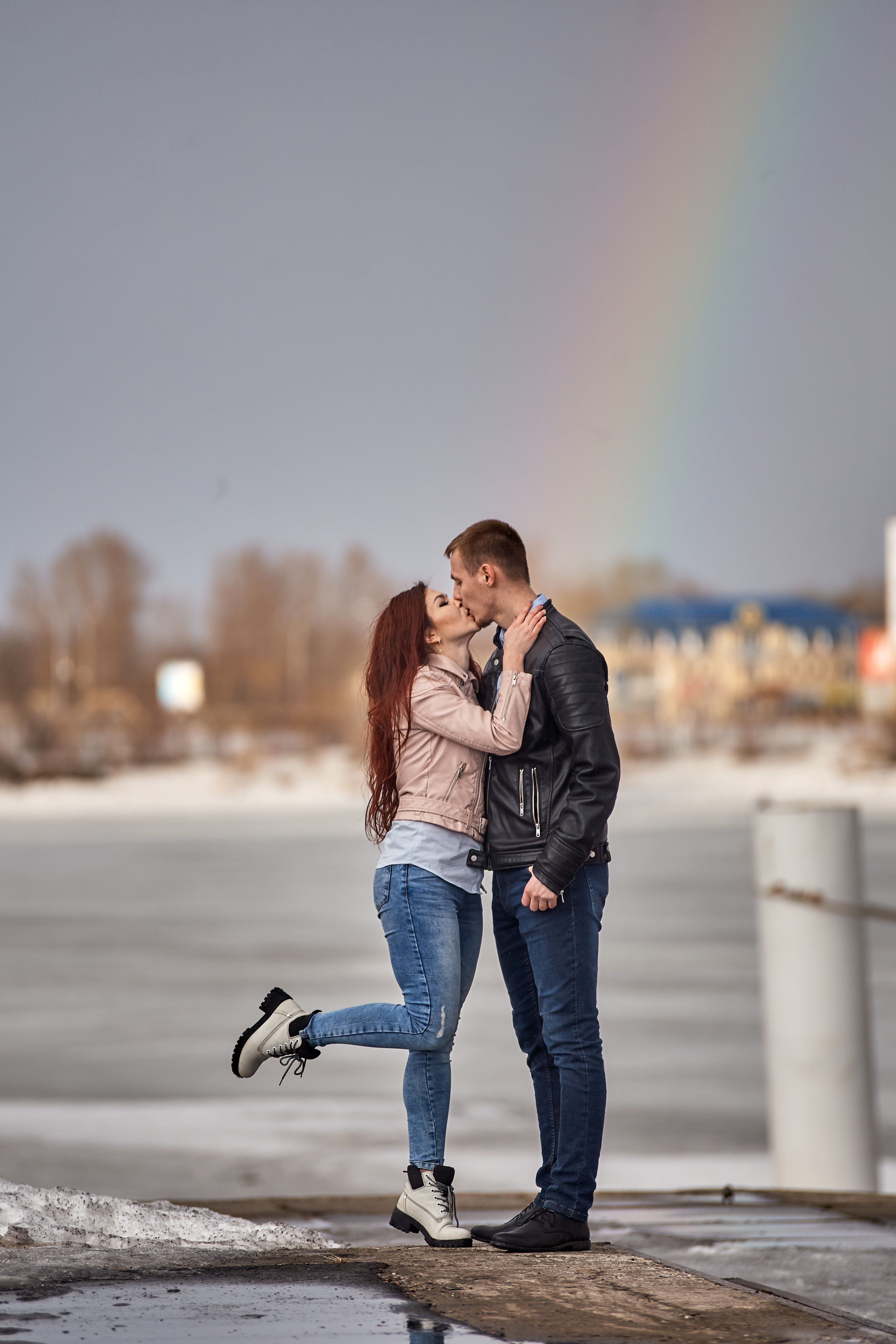 Woman Kissing a Man in Black Leather Jacket · Free Stock Photo