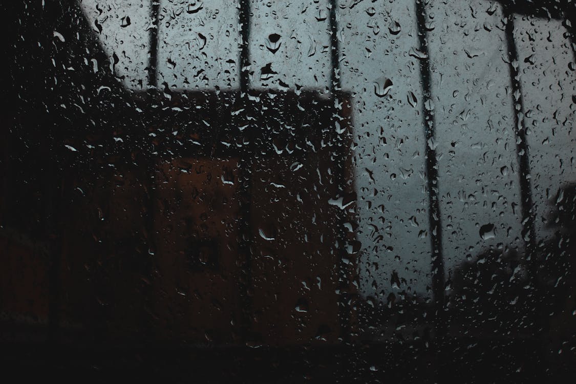 Water Droplets on Glass Window · Free Stock Photo