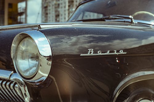 Close-up Photo of a Glossy Black Car 