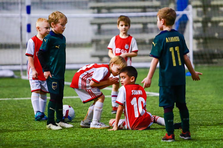 Little Boys Playing A Football Match 