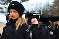 Woman in Black Knit Cap and Black Jacket