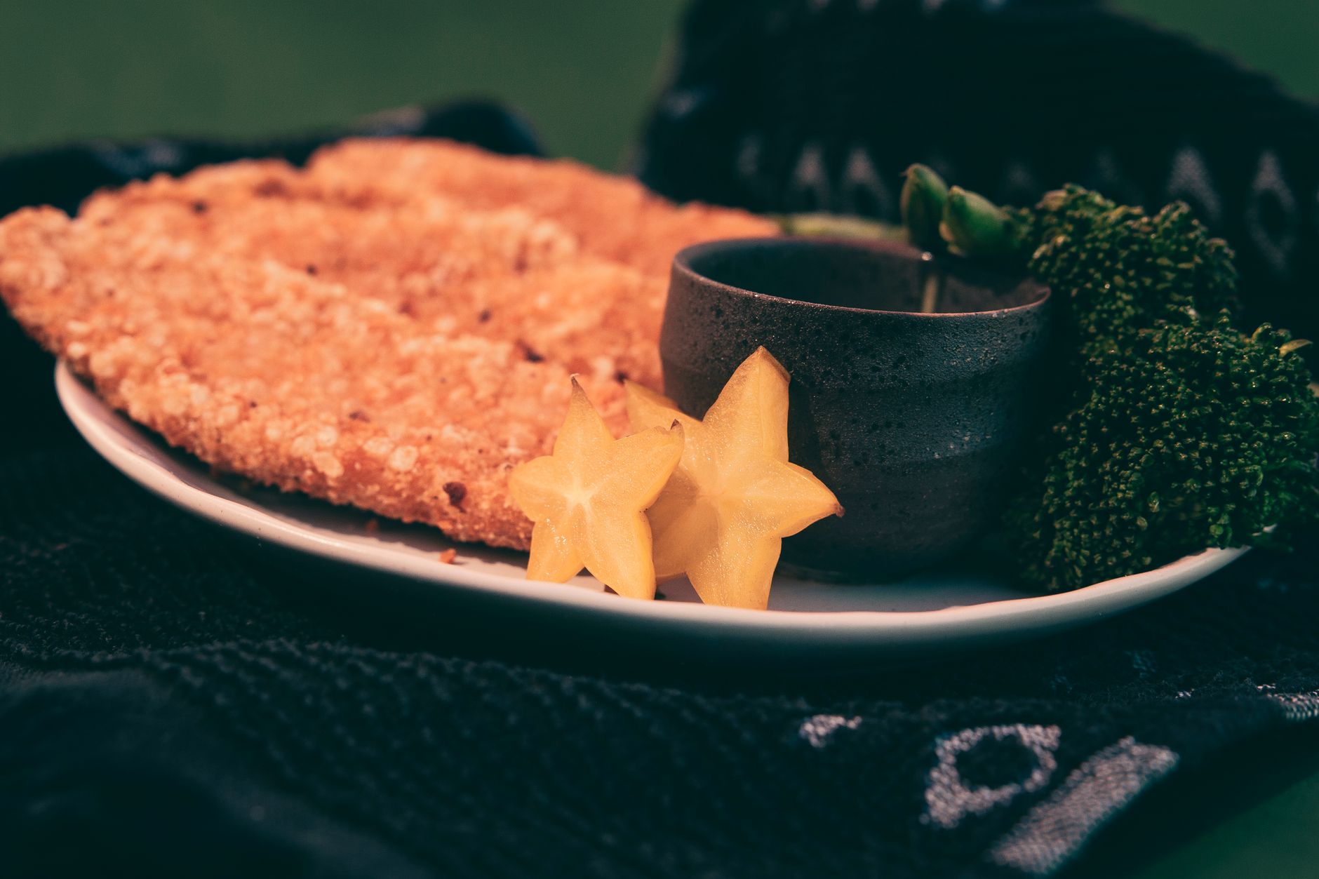 Crispy fried fish served with lemon wedges and tartar sauce