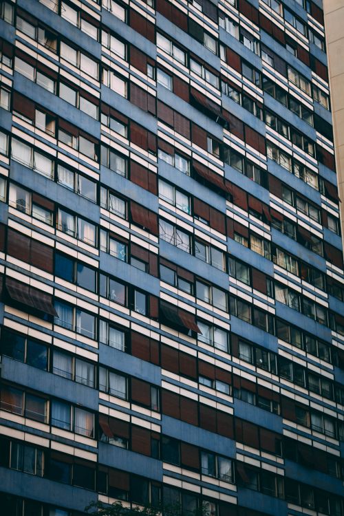 Free Modern high-rise building with a grid of windows in Bela Vista, São Paulo. Stock Photo