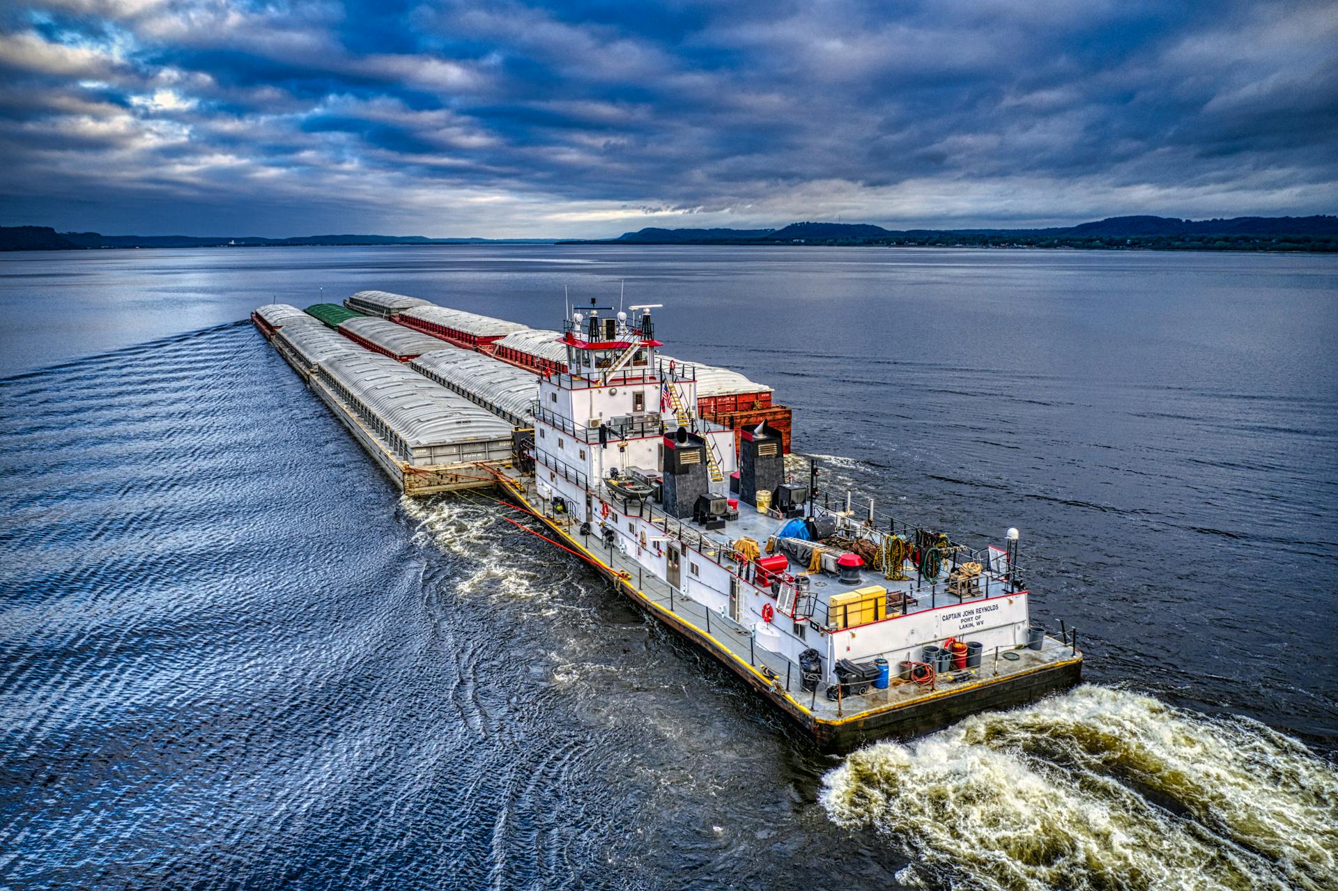 Aerial View of a Push Boat and Barges