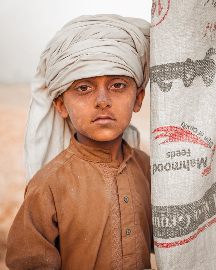 Boy With Shawl On Head