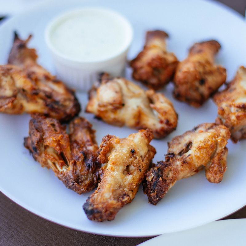 Crispy Baked Chicken Wings with Buffalo Sauce