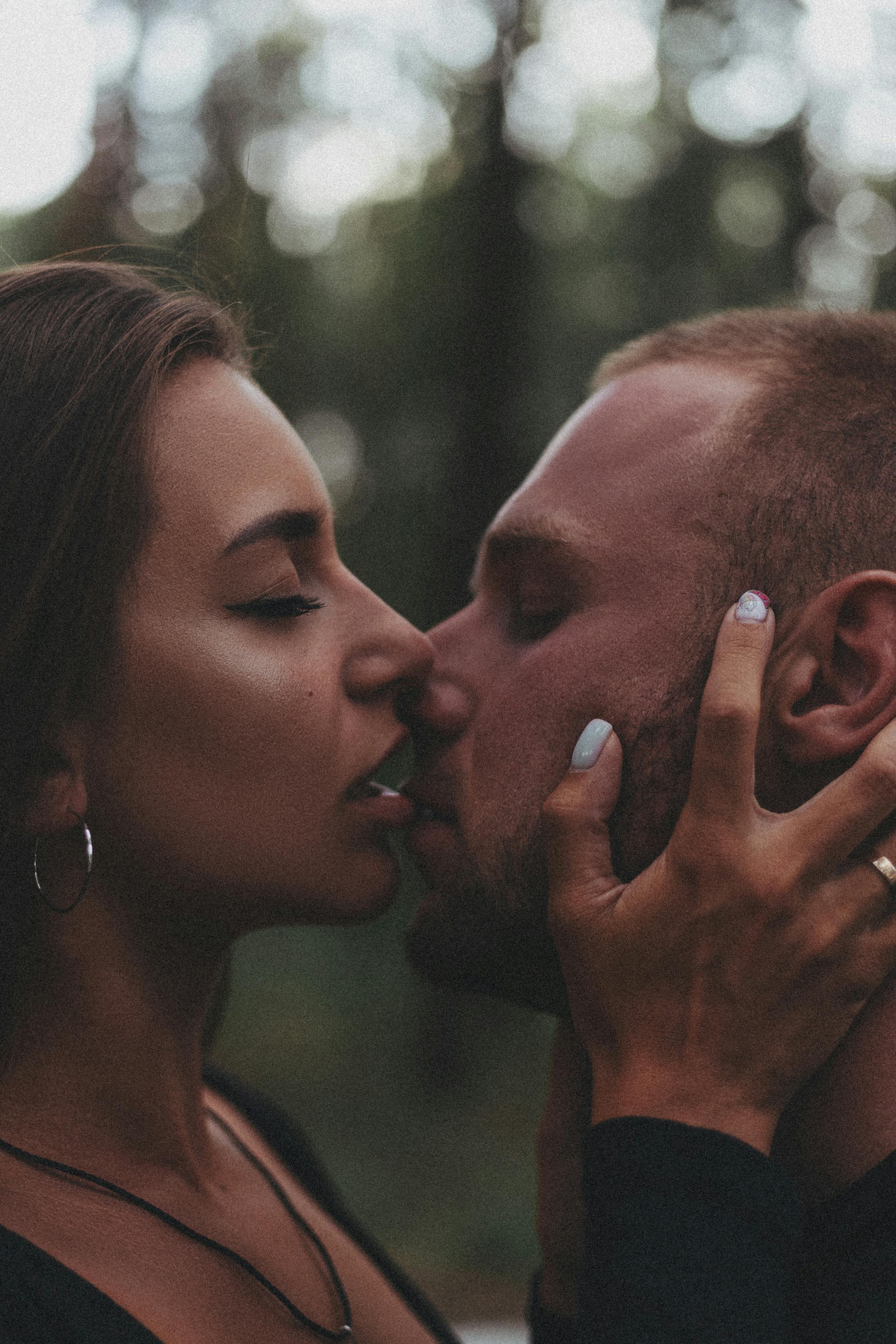 Woman and Woman Kissing with Eyes Closed Free Stock Photo