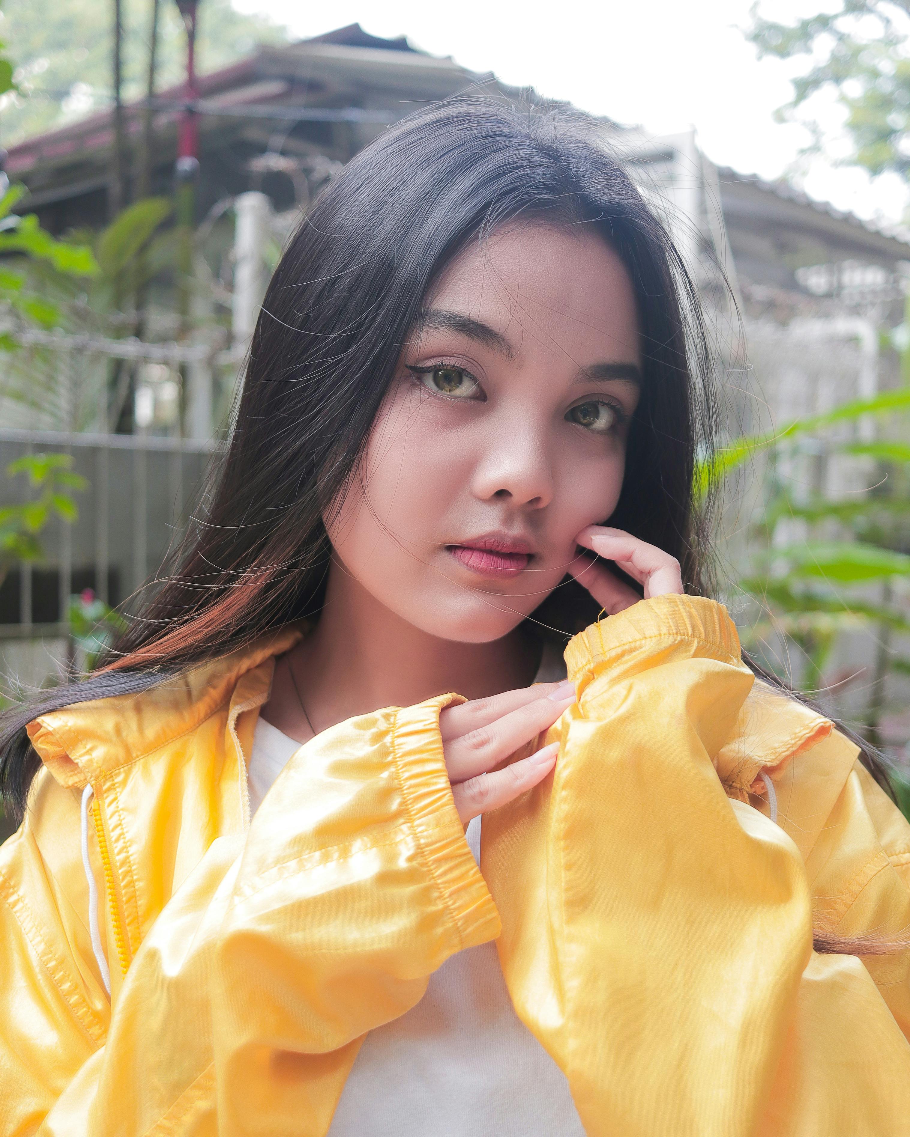 Girl in Yellow Jacket Smiling · Free Stock Photo