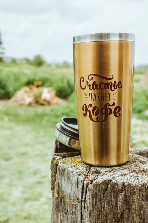 Gold Tumbler on a Tree Stump