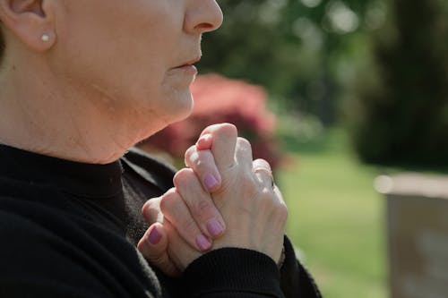 Close-up of Woman Holding her Hands Together 