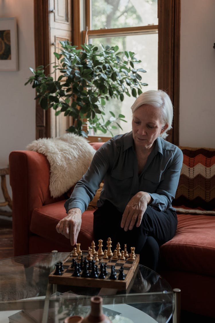 Photo Of An Elderly Woman Playing Chess