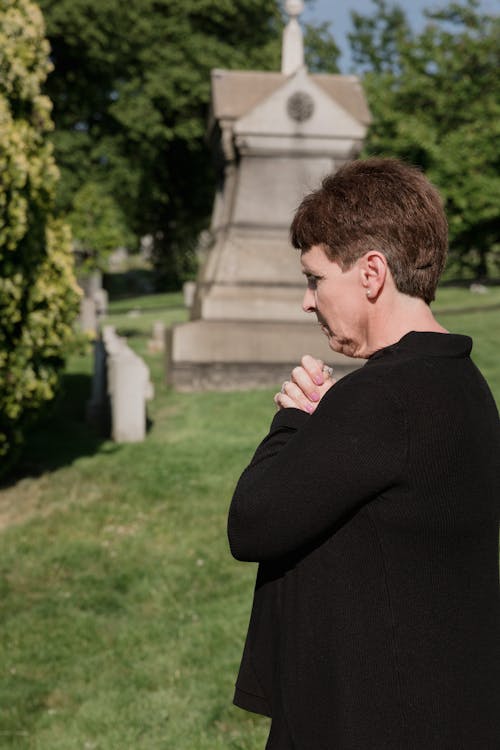 Side View of Woman With Short Hair Wearing Black Long Sleeves 