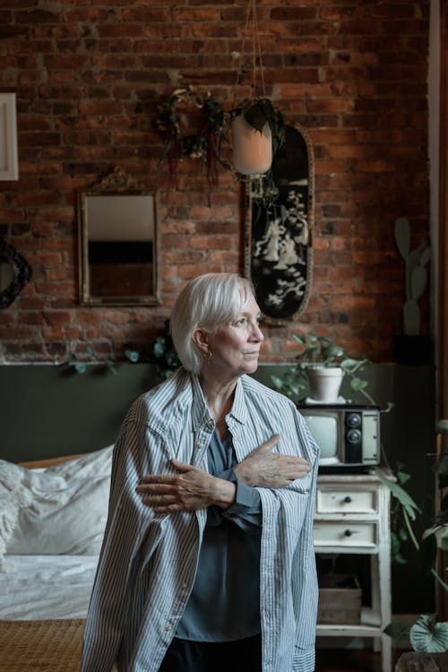 Elderly Woman with Gray Hair Looking Away