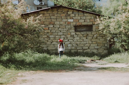 Free stock photo of abandoned building, flowers, girl
