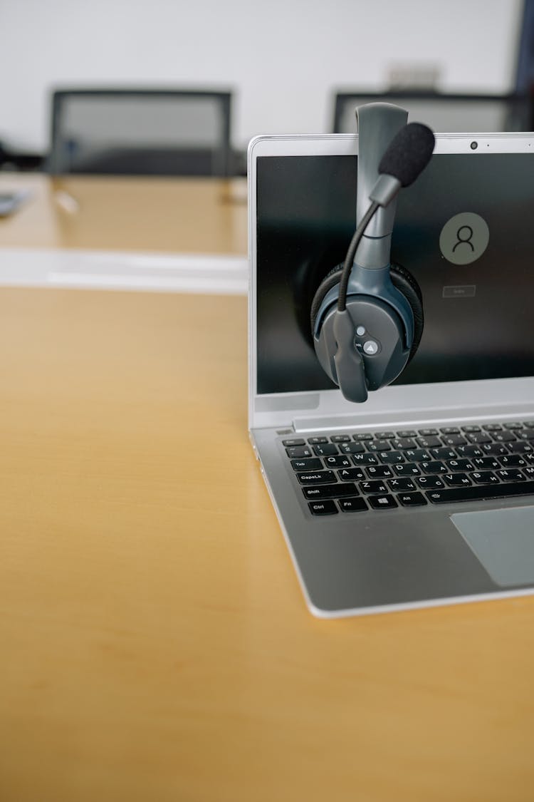 Close-Up Shot Of A Headset On A Laptop