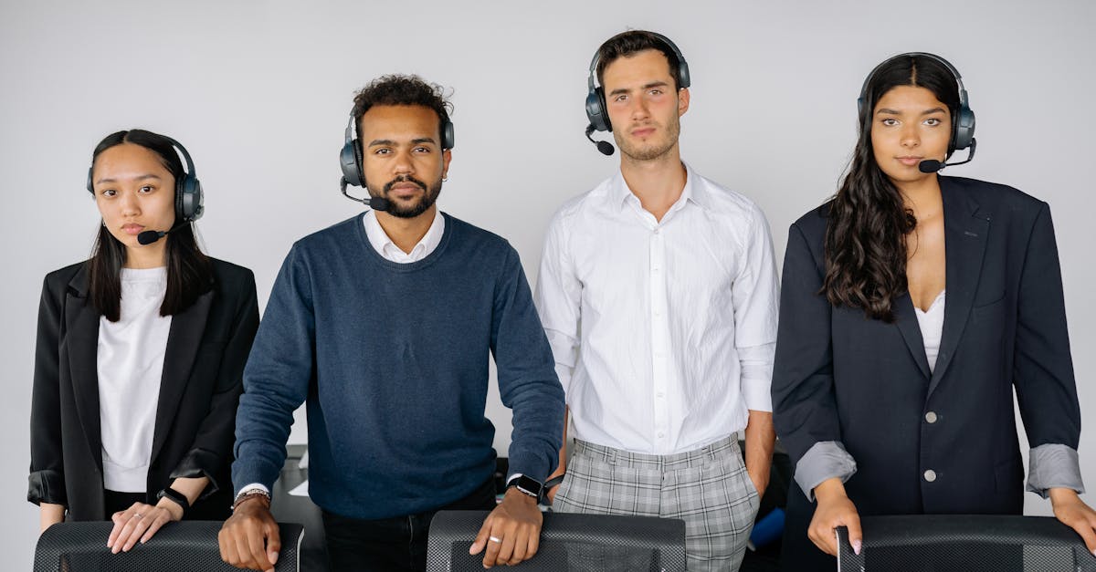 A diverse team of customer service agents wearing headsets, ready to assist.