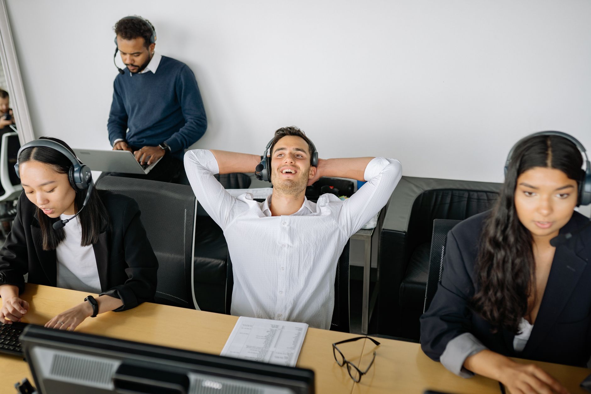 Call center professionals at work stations