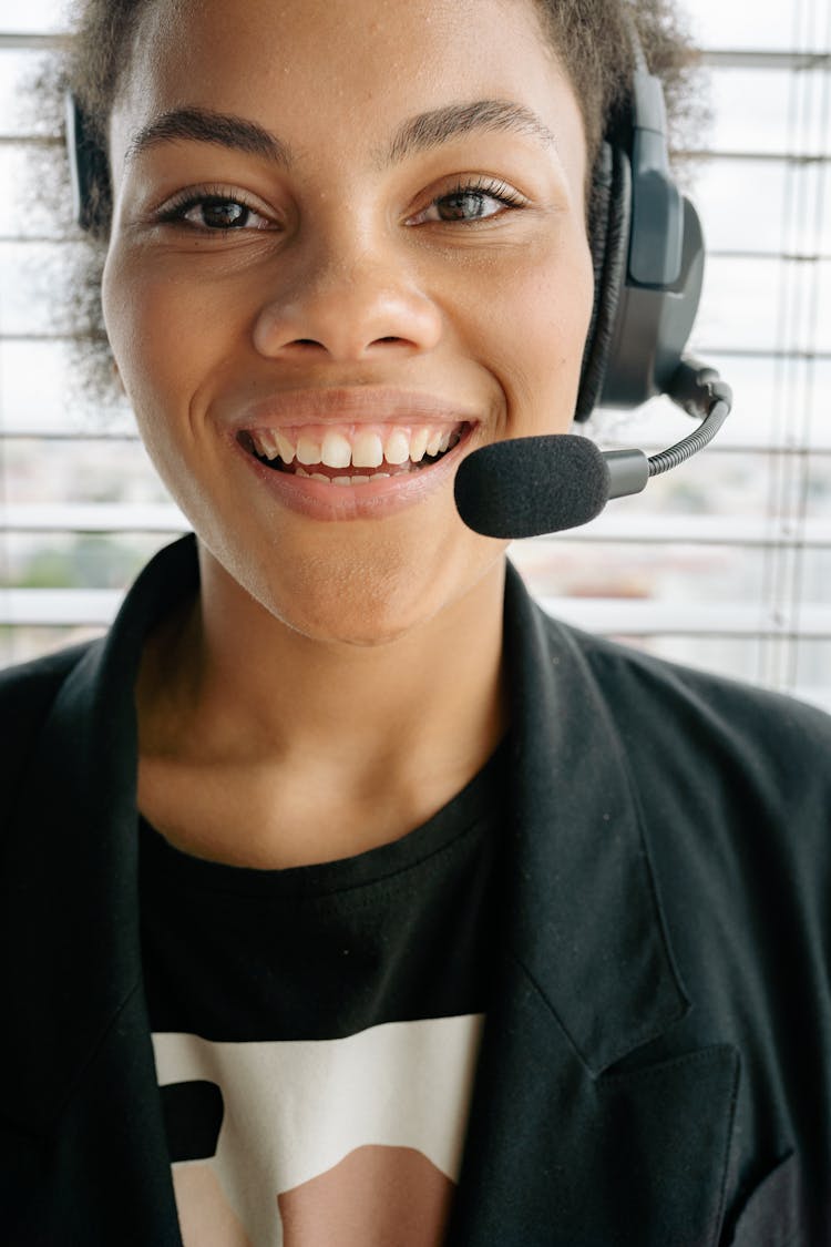 Woman Wearing A Headset With Microphone