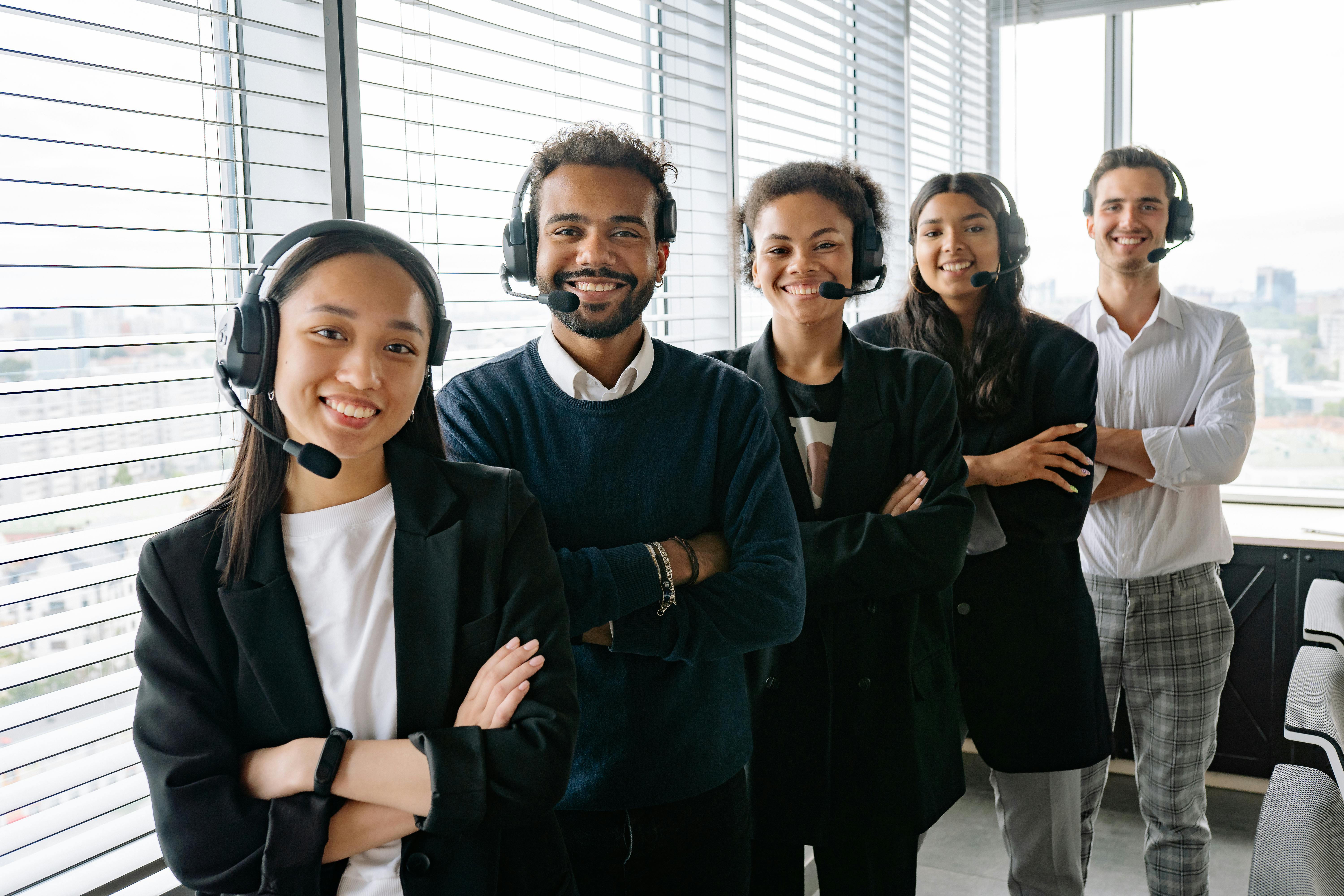 people wearing headsets in an office