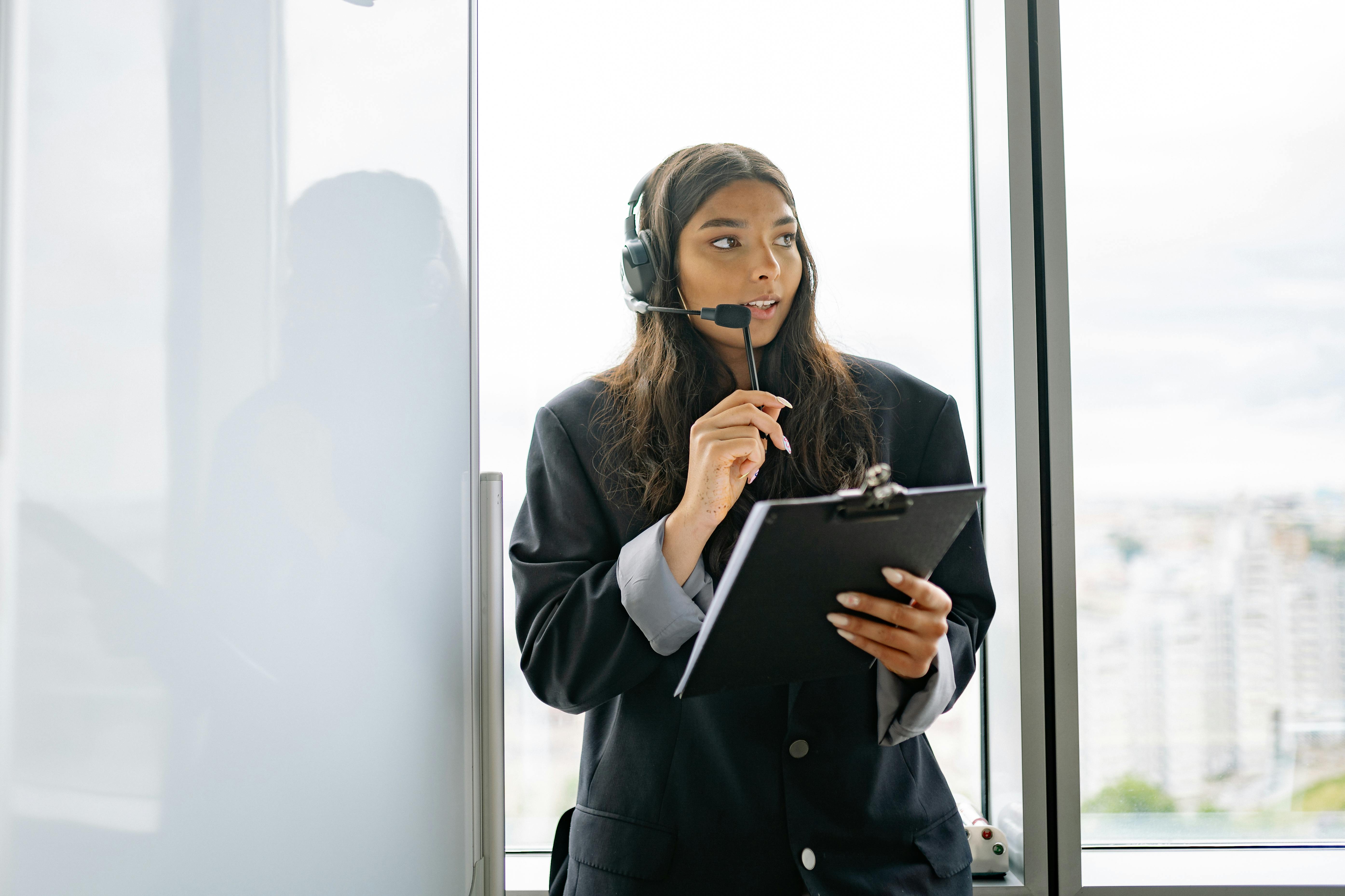 A Tired Man Sitting at His Desk Rubbing His Eyes · Free Stock Photo