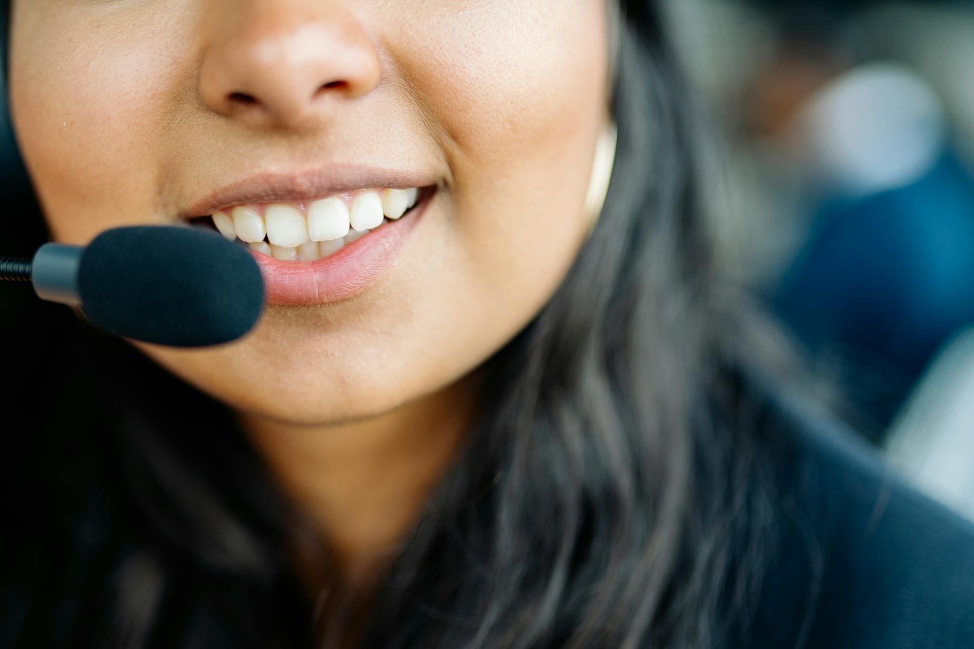 A Smiling Agent Talking to a Client