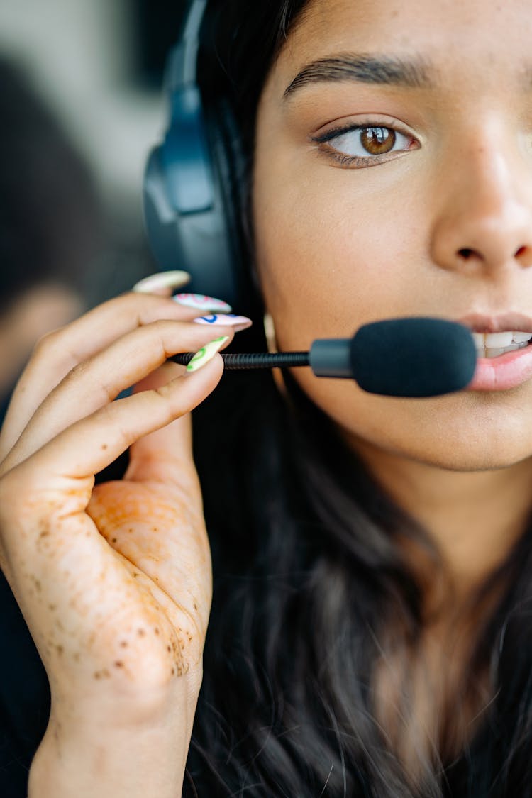 Close UP Photo Of A Woman Wearing Headset