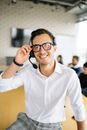 Man in White Dress Shirt Wearing Black Framed Eyeglasses