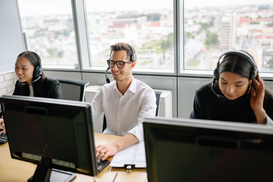 happy, productive employees in a clean, bright office setting - commercial cleaning services brooklyn happy, productive employees in a clean, bright office setting - commercial cleaning services brooklyn