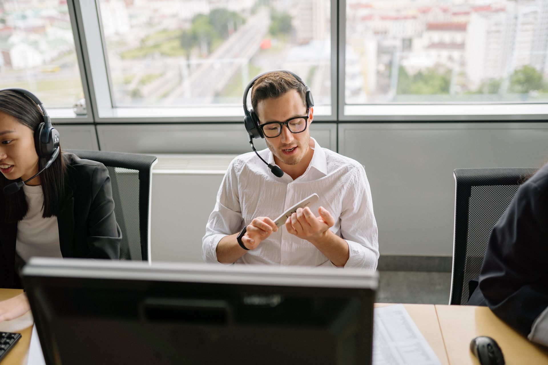 A Man and Woman Working in the Call Center