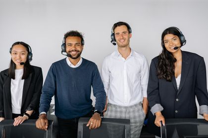 Customer service representatives wearing headsets in an office — Yan Krukau on Pexels