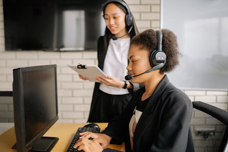 Two Women Working In The Office