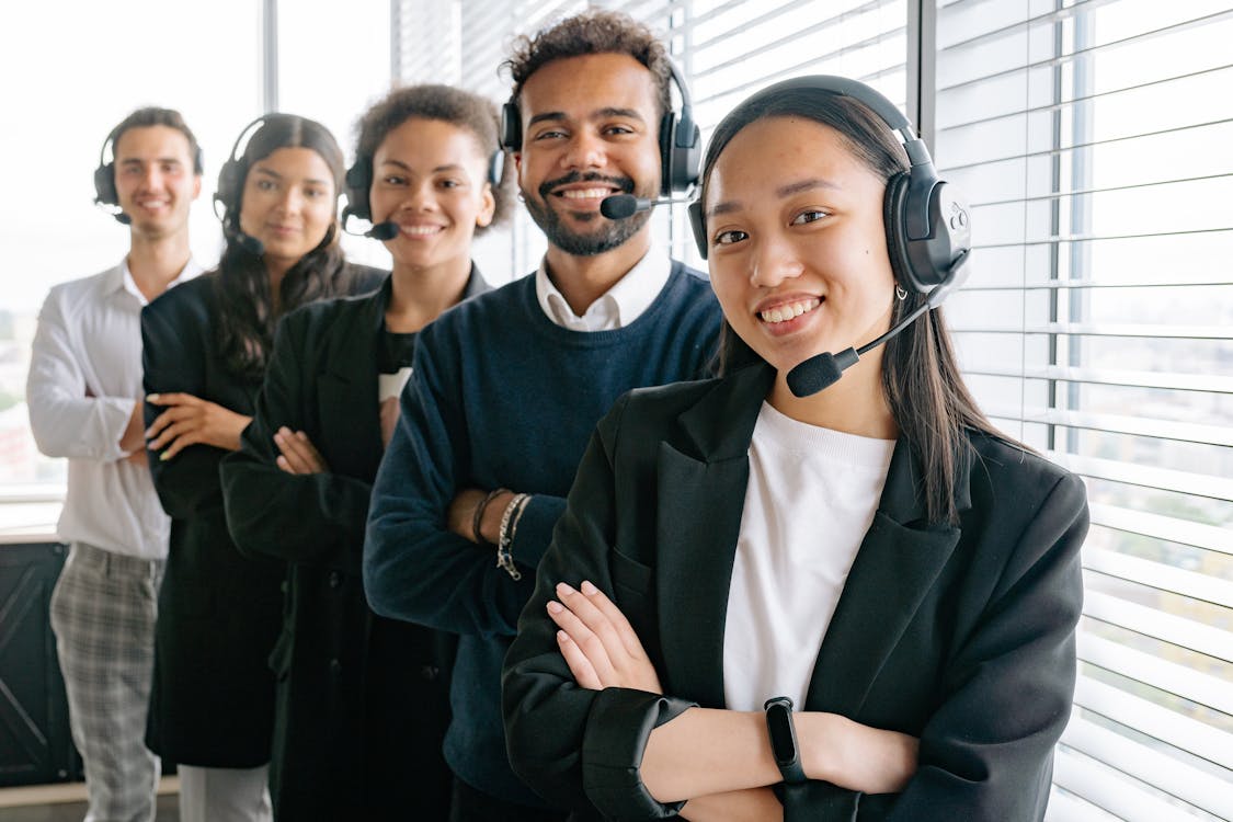 Free Happy Call Center Agents Looking at Camera Stock Photo