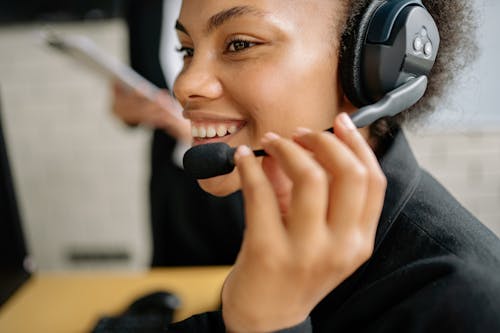 Free A Smiling Call Center Agent Stock Photo