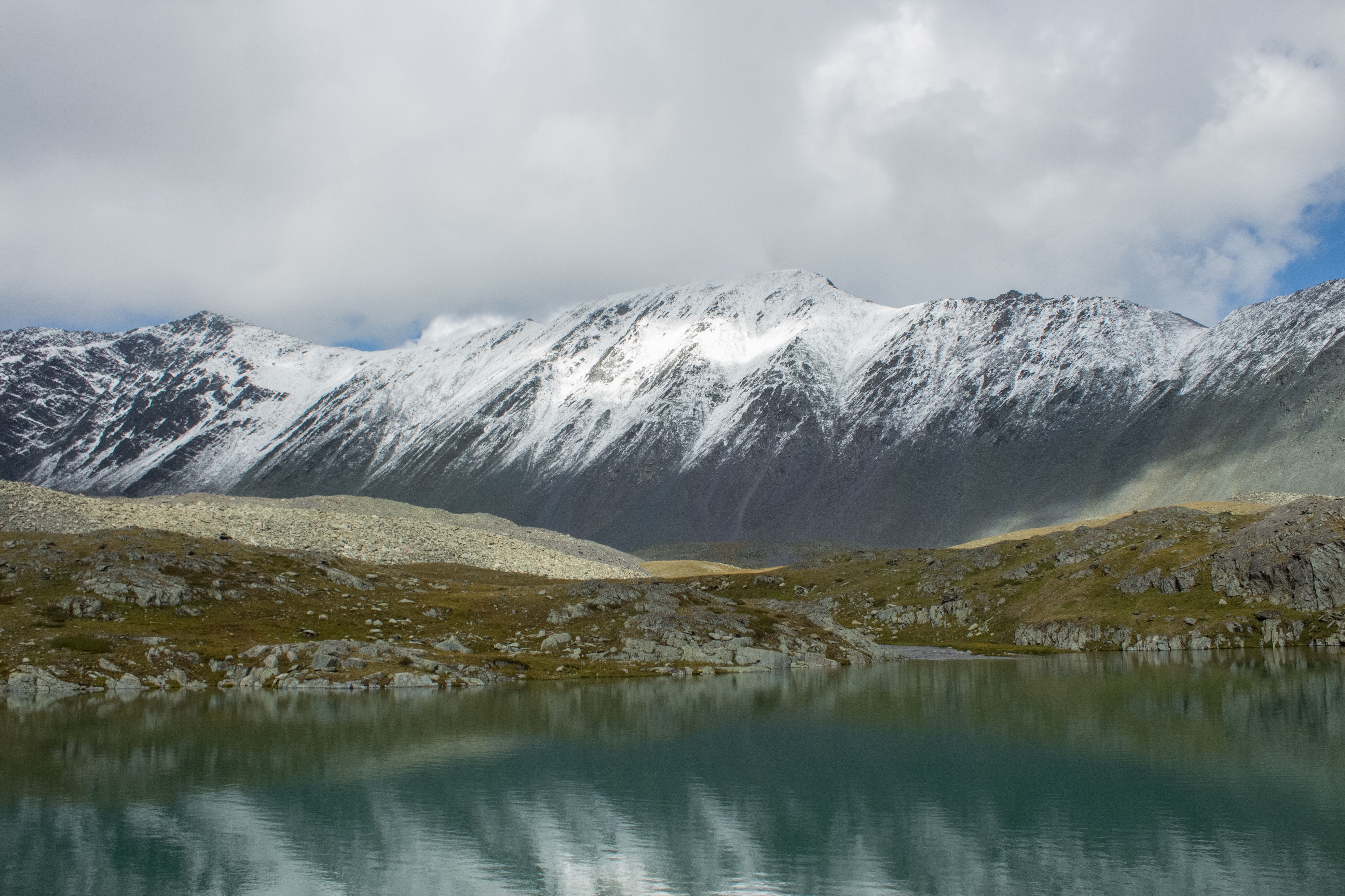 Snow Covered Mountain Near Lake · Free Stock Photo