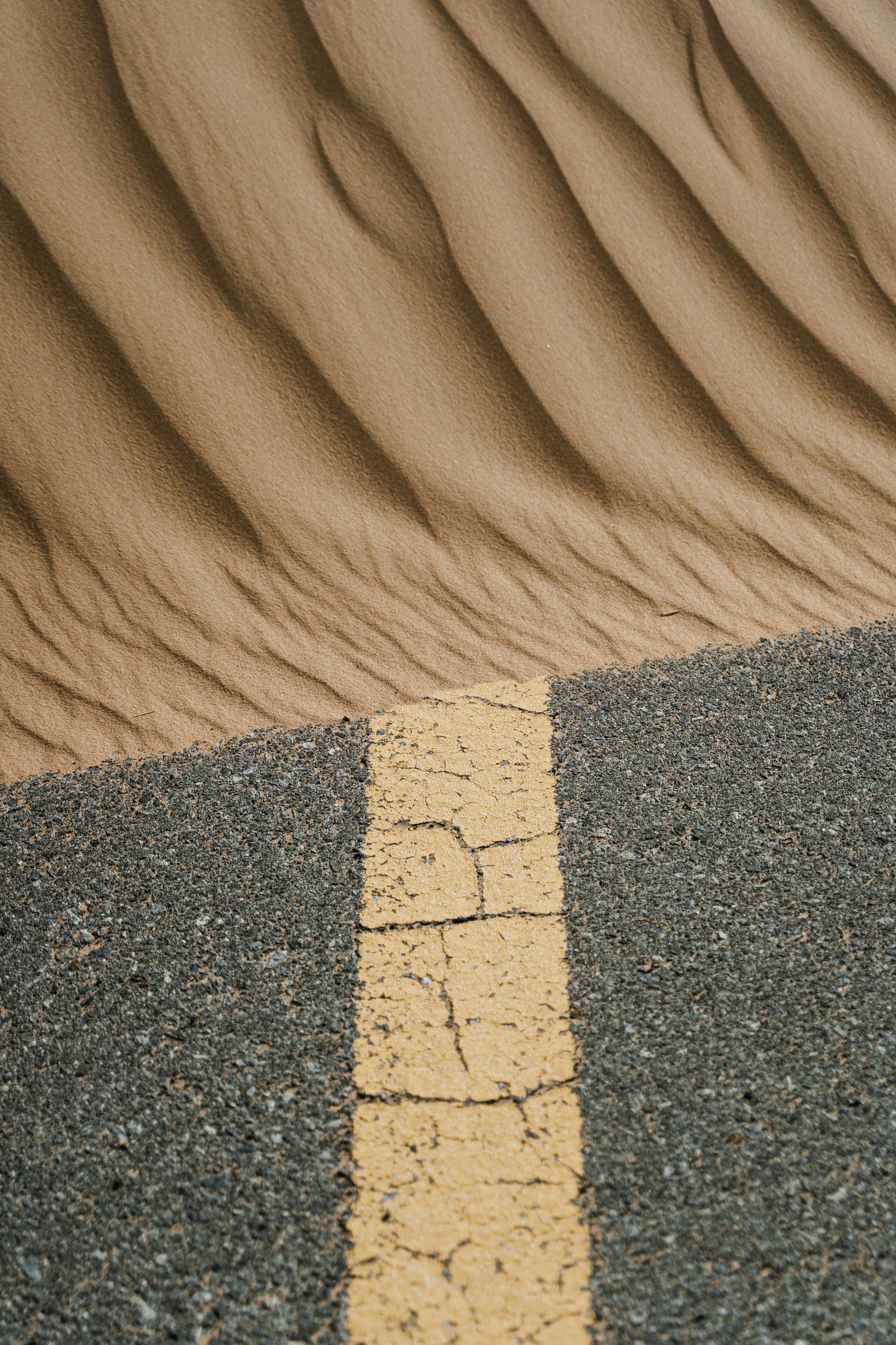sand on asphalt