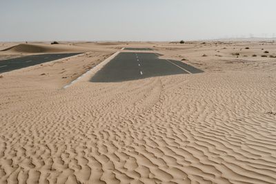 Empty highway through desert scrub — MART PRODUCTION on Pexels
