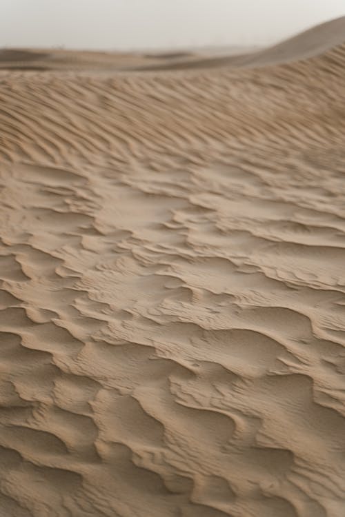 Brown Sand in Close Up Photography