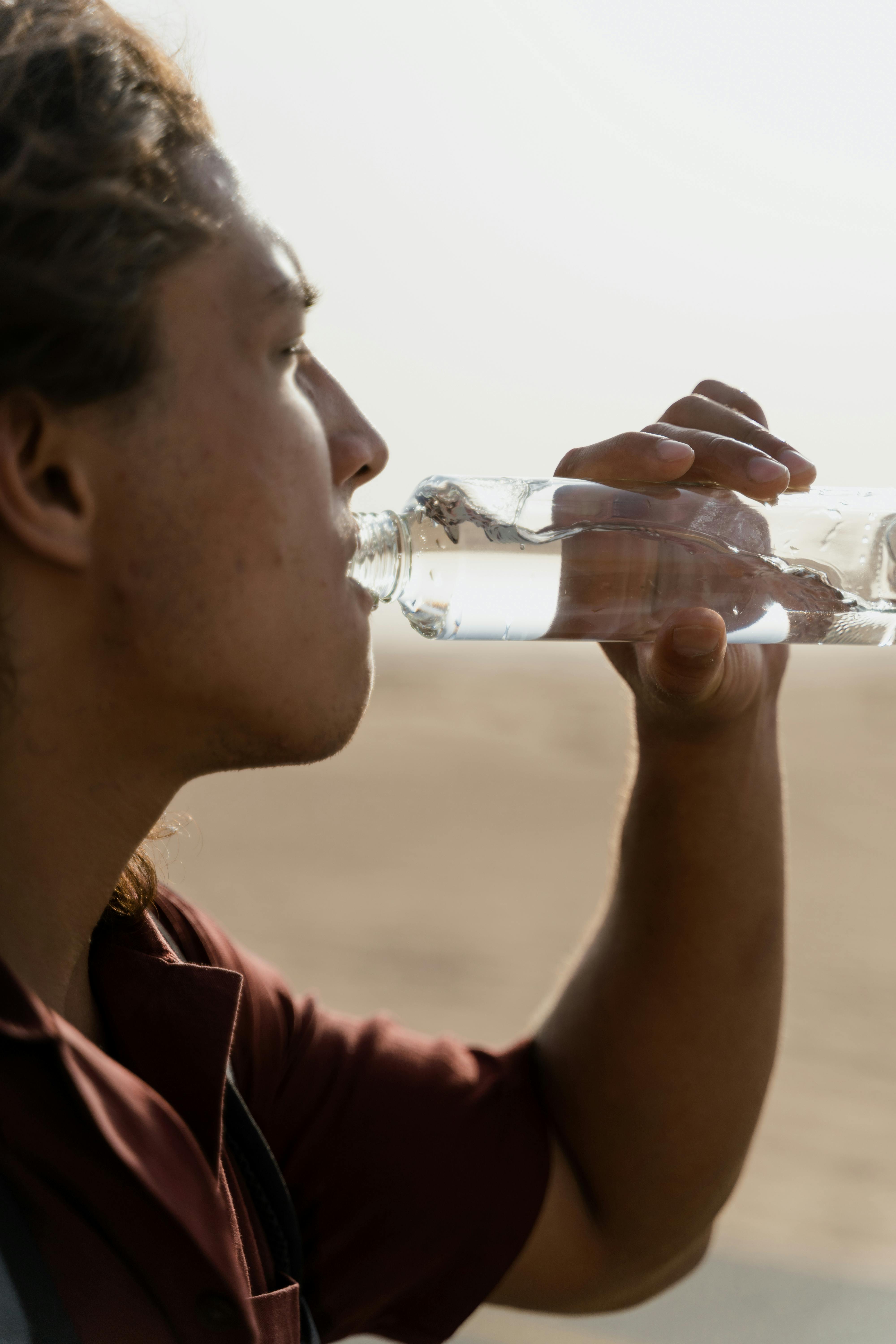 Man Drinking Water from Bottle Stock Photo by ©SimpleFoto 11324638