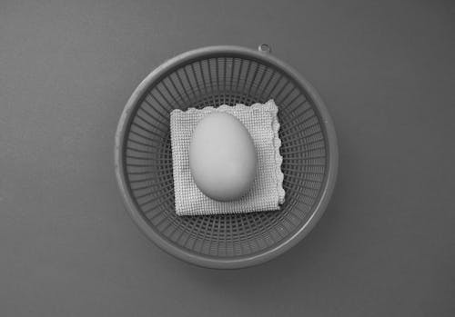 Close-Up Shot of Eggs in a Mesh Basket