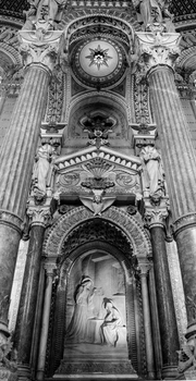 Stunning monochrome capture of ornate church interior showcasing detailed carvings and religious art