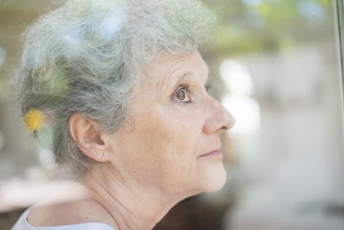 A Close-Up Shot of an Elderly Woman